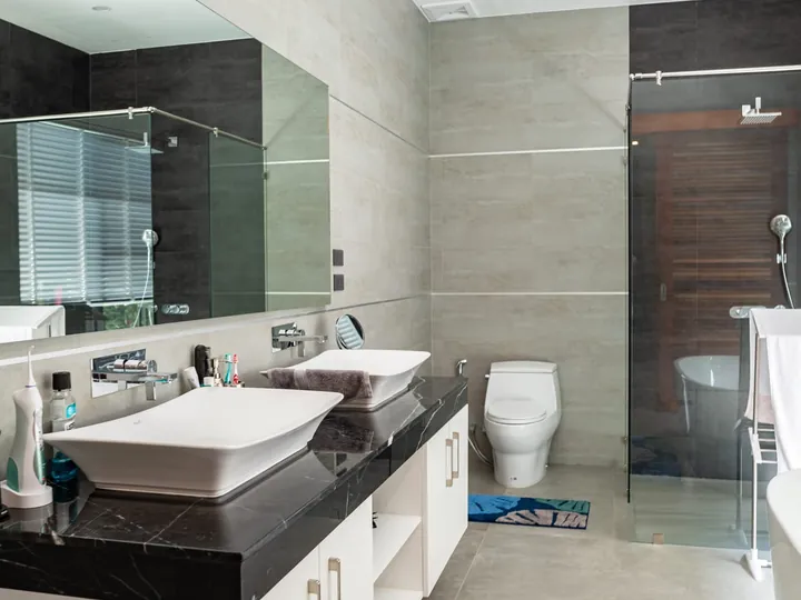 Contemporary bathroom with double vanity and walk-in shower