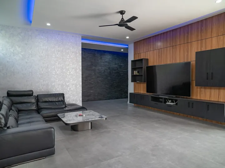 Spacious television lounge with garden views