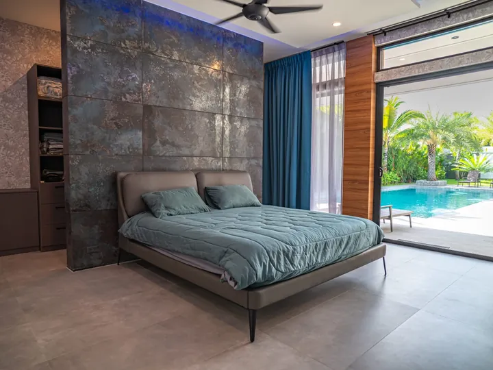 Primary bedroom with direct pool access